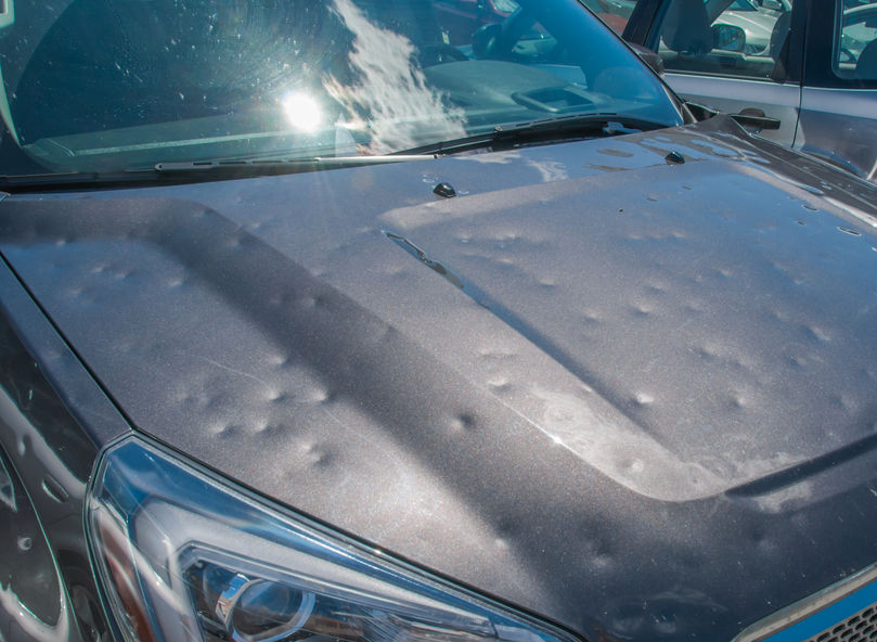Vehicle with hail damage ready for paintless dent repair