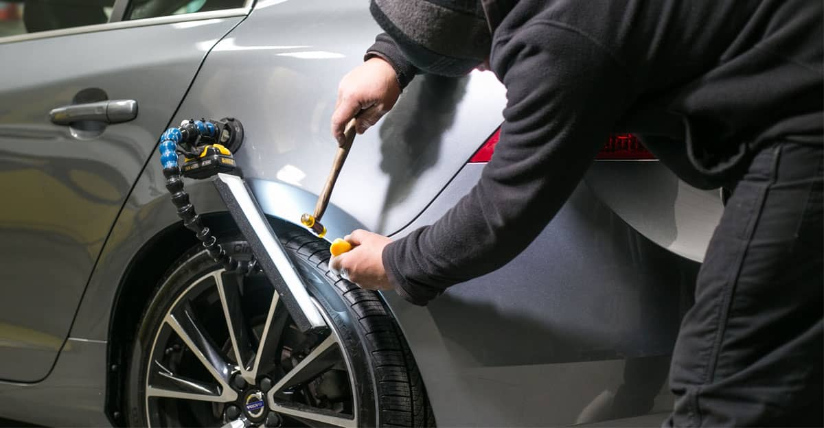 Madison Dent Repair team member working on vehicle dent repair